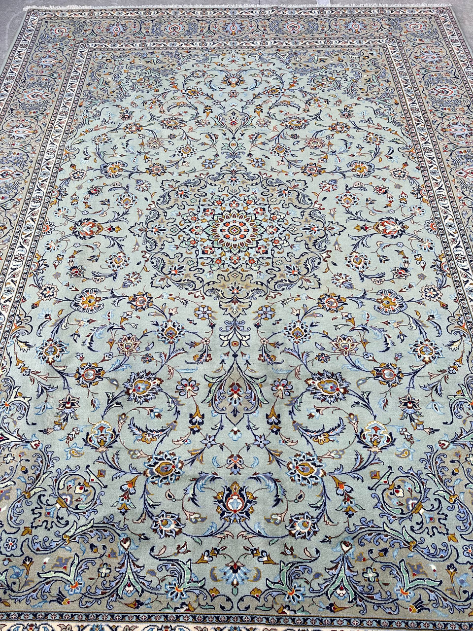 green kashan rug