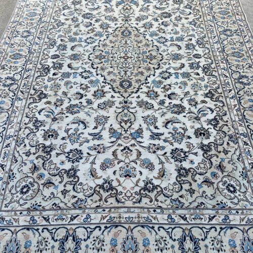 beige kashan rug